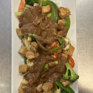 Stir-fried tofu and assorted vegetables served w/peanut sauce